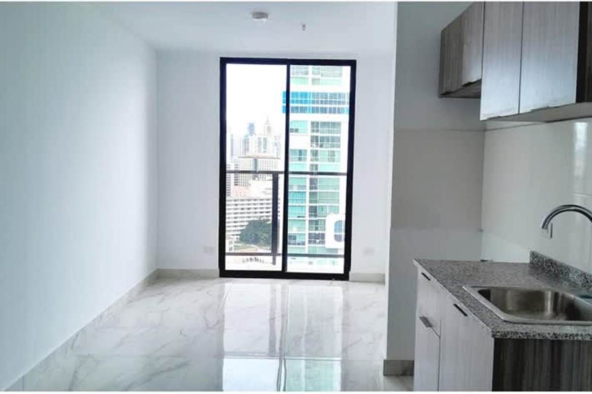 Spacious living dining granite floor-to-ceiling windows PH The Gray Panama City apartment