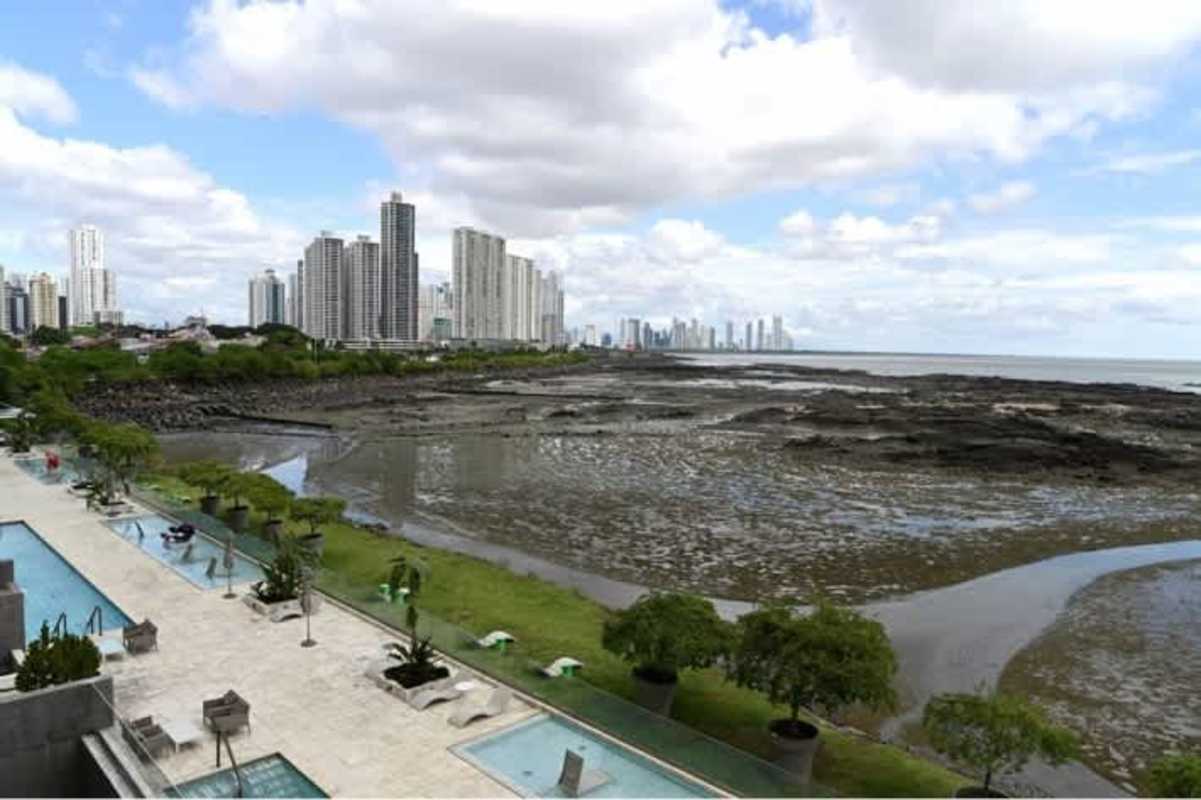 Elegant infinity pool overlooking Pacific Ocean in luxury tower The Residences Punta Pacifica Panama City.
