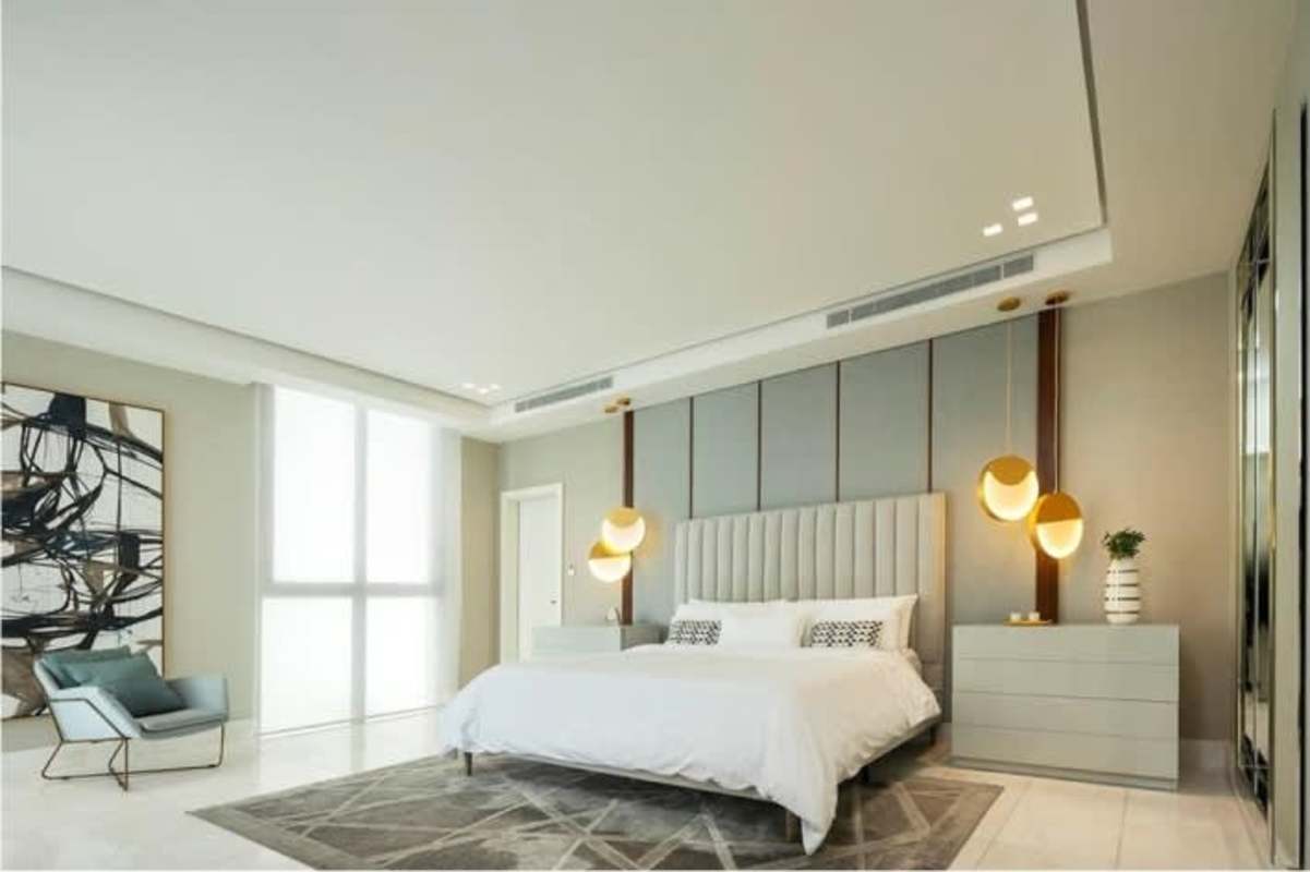 Bedroom with ensuite bath and walk-in closet bright natural light PH The Residences Panama City
