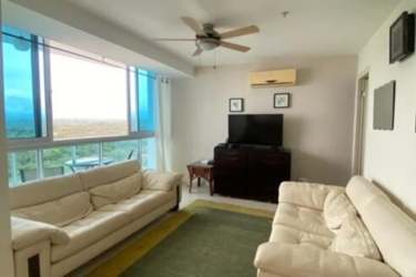 Bedroom with ocean views, AC, ceiling fan in Coronado beachfront condo