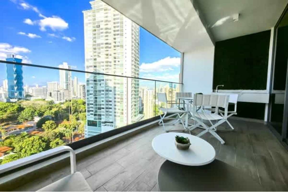 Modern kitchen with island, stainless steel appliances at Prestige Tower Bella Vista Panama City