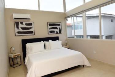 Stylish bathroom with mosaic tiles walk-in shower glass door Paradise Point Coronado Panama