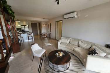 Bedroom with split AC, large windows and closet in Explora Panama Pacifico apartment