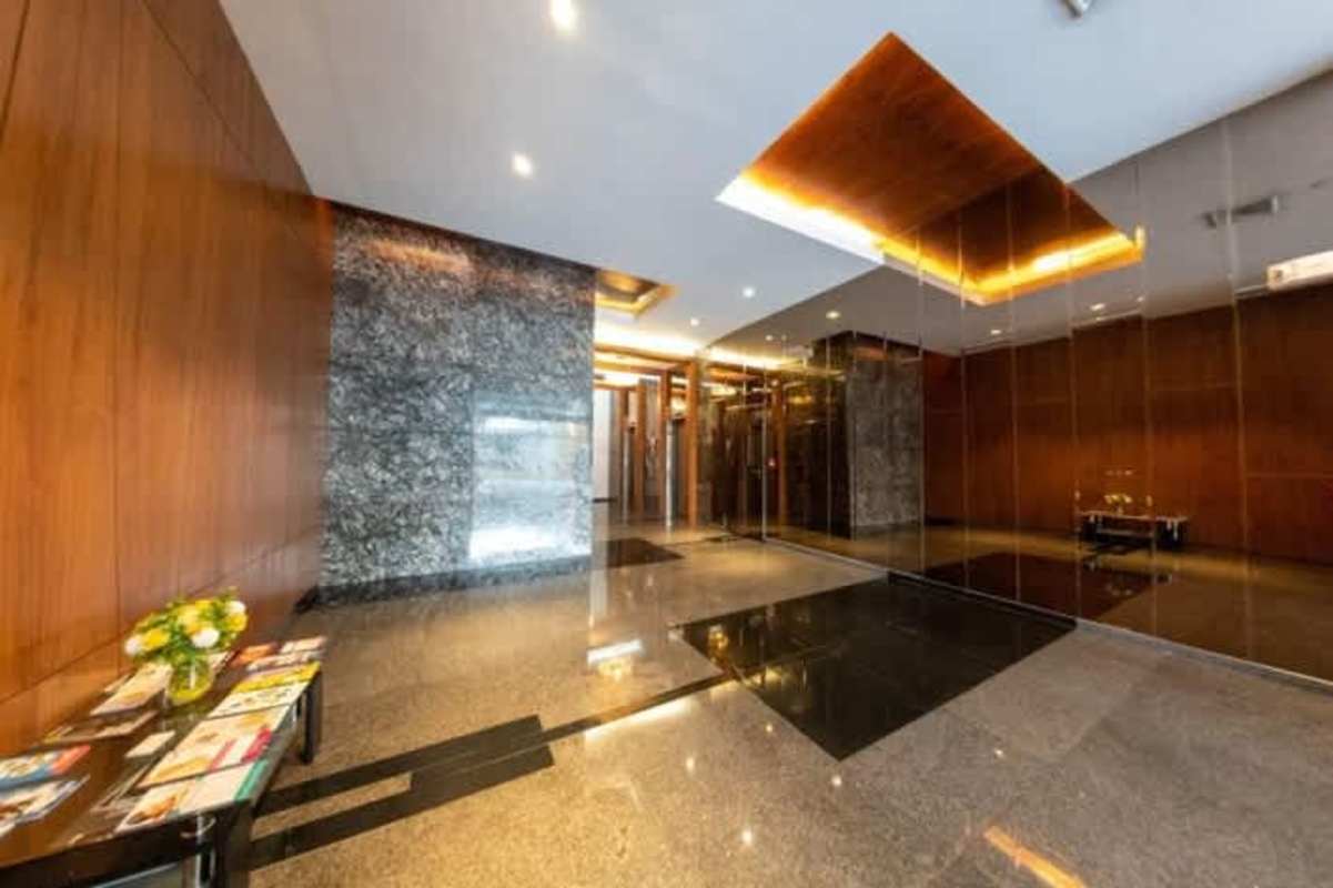 Multiple elevators digital panels and luxury finish lobby at Plaza 77 via Brasil Panama City
