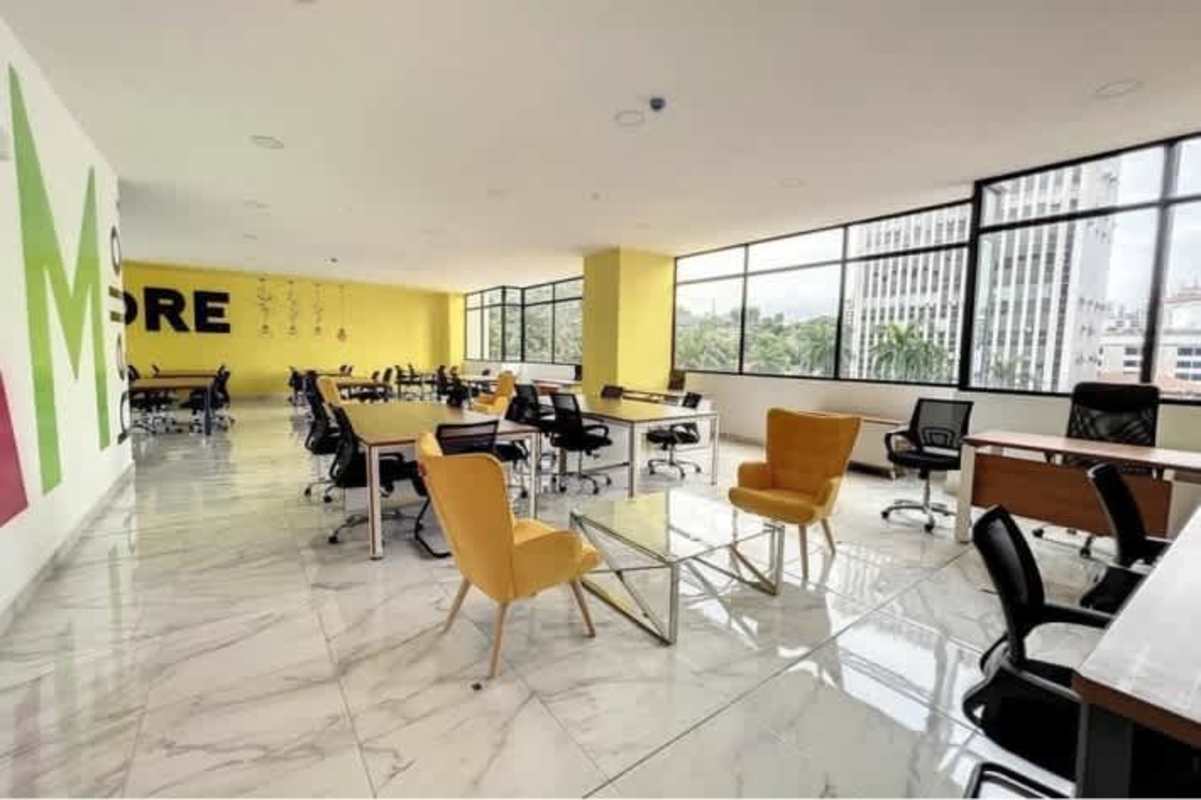 Private office workspace with natural light and vibrant decor at The Gray Obarrio