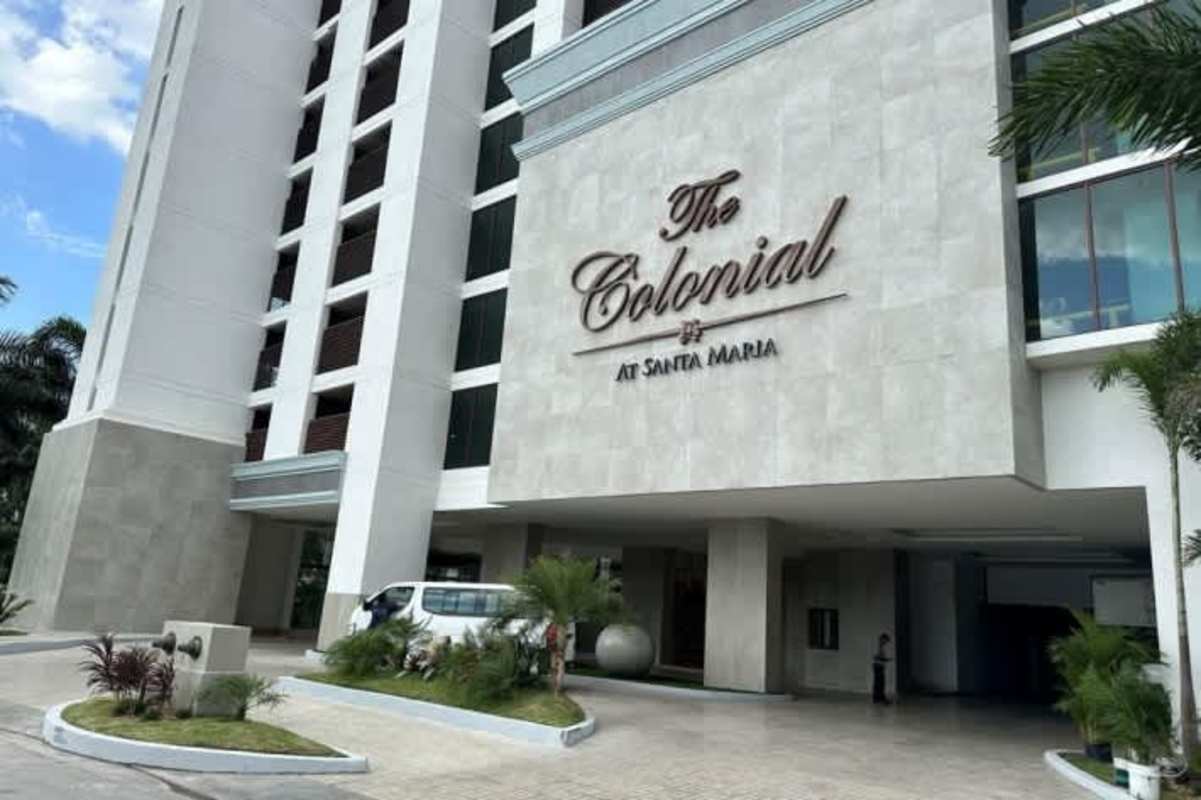 Walk-in closet with custom shelving in luxury apartment The Colonial Santa María