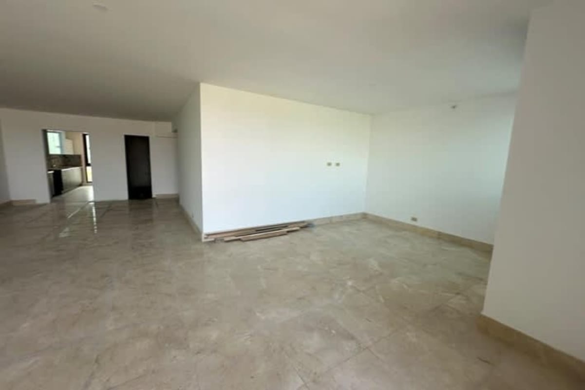 Spacious open living room with marble flooring at The Colonial Santa María Panama