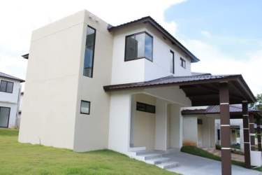 Open plan living dining room with large windows natural light in Costa Verde house Panama Oeste