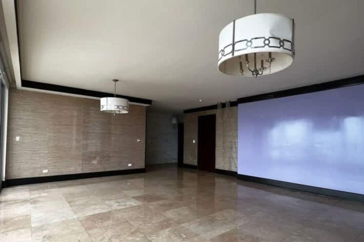 Contemporary living area with city and water views luxury condo Panama