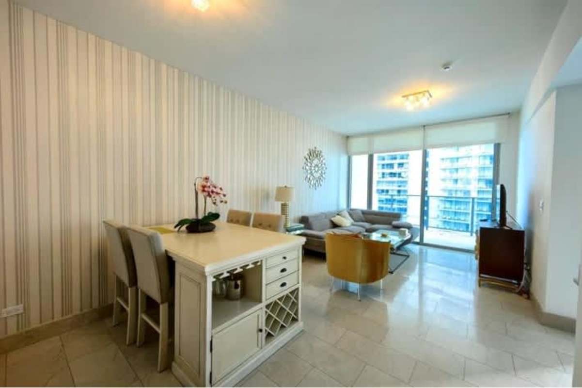 Fully equipped modern kitchen with granite counters and stainless steel appliances in Grand Tower Punta Pacífica Panama