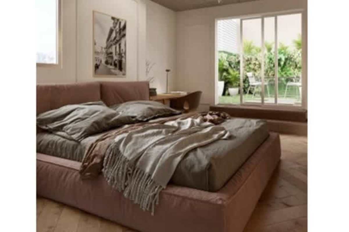 Stylish bedroom with balcony doors wood floor Casco Viejo boutique condo Panama