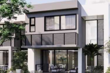 Modern townhouse facade with balcony, black railing, patio and garden Imaterra Panama Pacifico