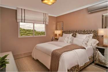 Spacious living room with large window and open floor plan Bosques del Pacífico Panama