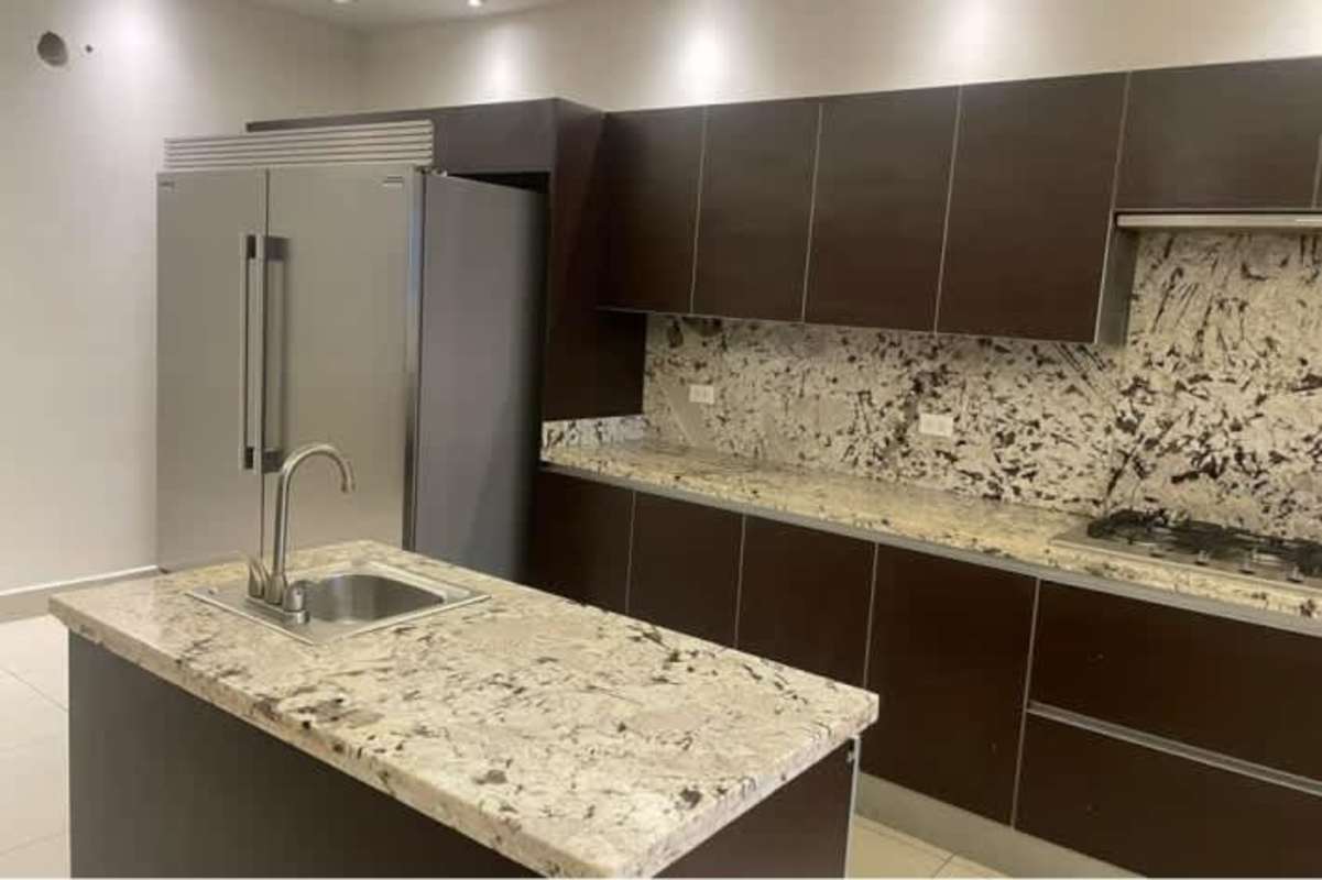 Spacious private balcony overlooking lush greenery at PH Embassy Gardens Panama City