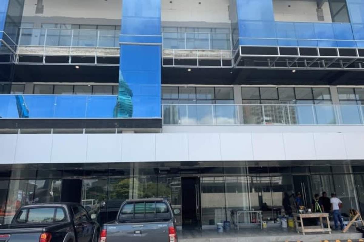 Underground parking garage multiple marked spaces commercial complex Panama