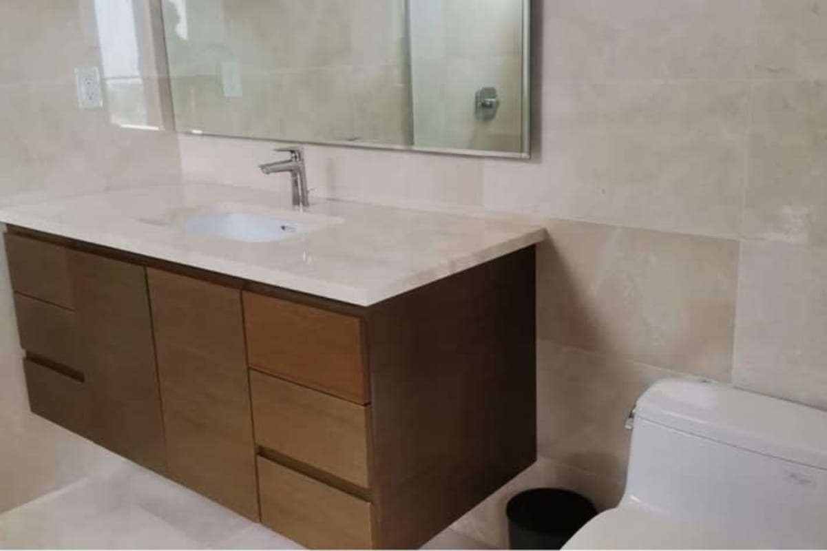 Large bright bedroom with golf views and walk-in closet in luxury apartment Santa Maria