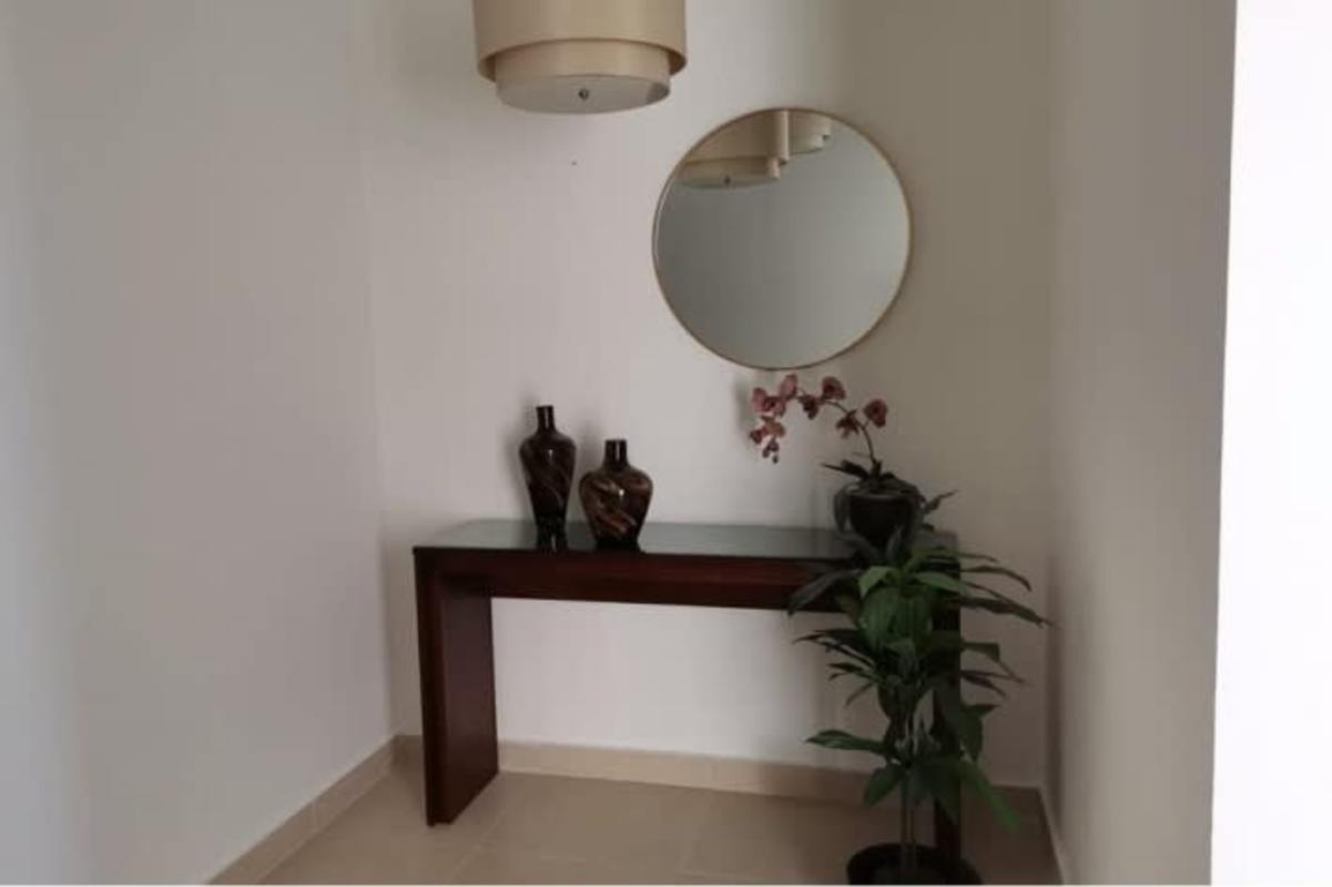 Modern hallway with console table entry in PH BICSA Tower