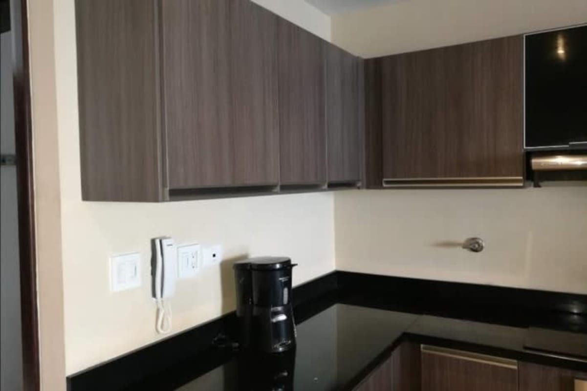 Granite kitchen counter with appliances PH BICSA Condo Panama City