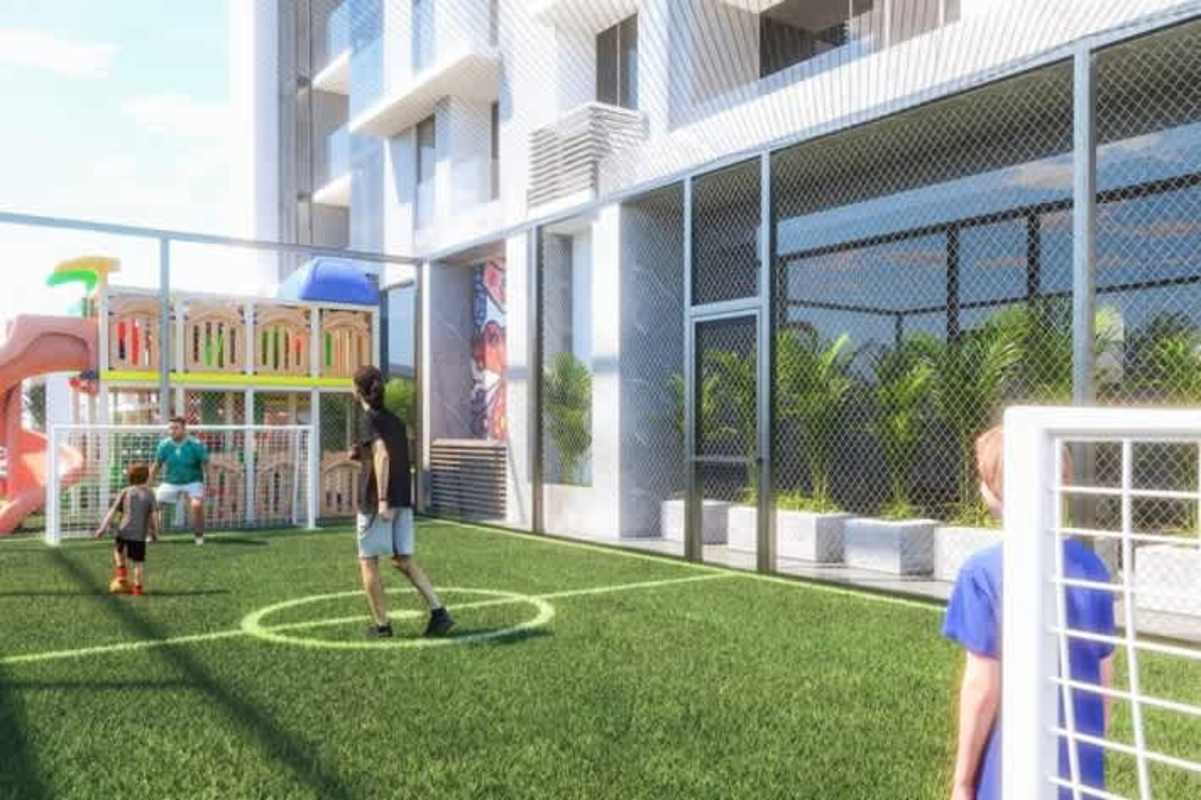 Mini soccer field with children's play structures at PH Next Panama high-rise luxury condos