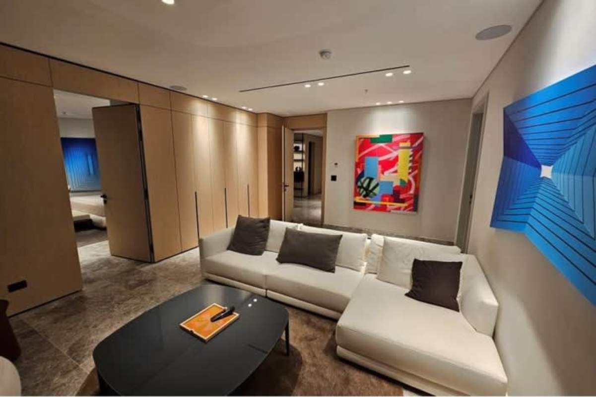 Luxury private cinema room with leather recliners and ambient lighting in oceanfront condo Panama