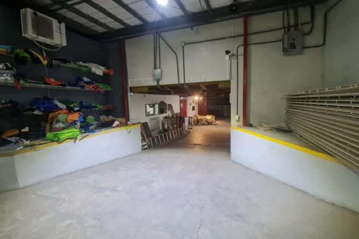 Warehouse in Betania Panama interior featuring shelving multiple loading bays open space