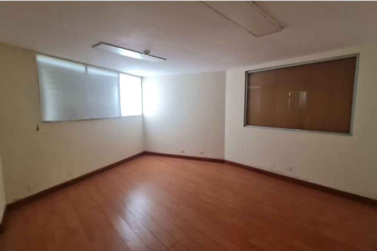 Empty commercial office or showroom inside warehouse with windows wooden floors Betania Panama