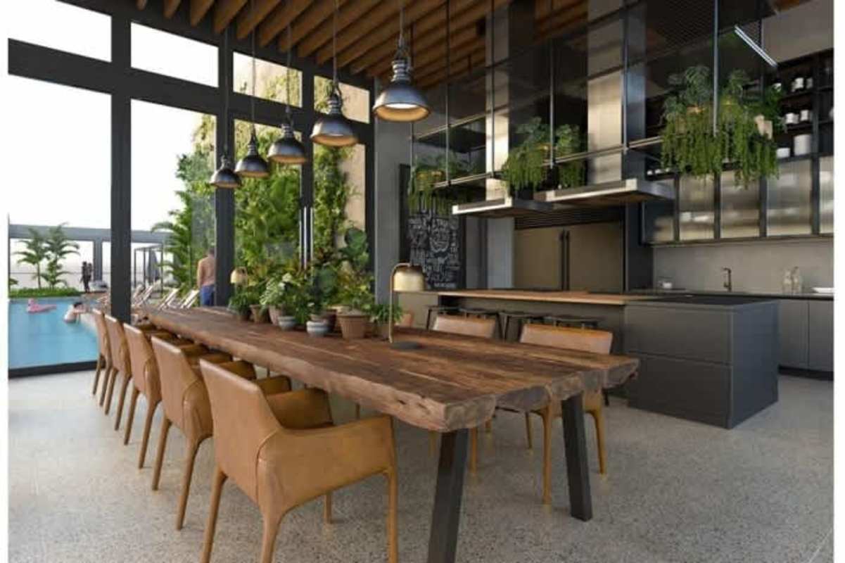 Modern loft with double-height living room and mezzanine, floor-to-ceiling windows with ocean views