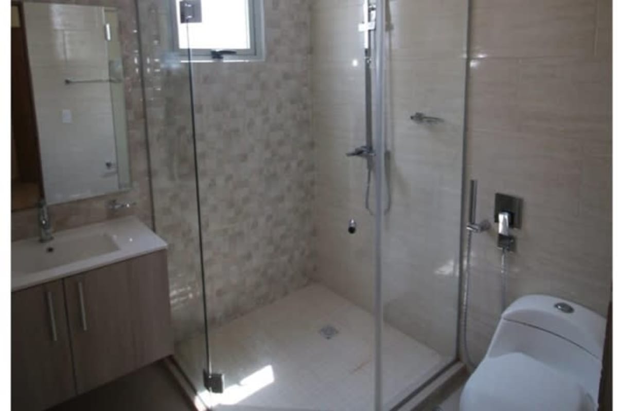 Modern apartment kitchen with granite countertops and stainless steel appliances PH La Loma Tower Panama