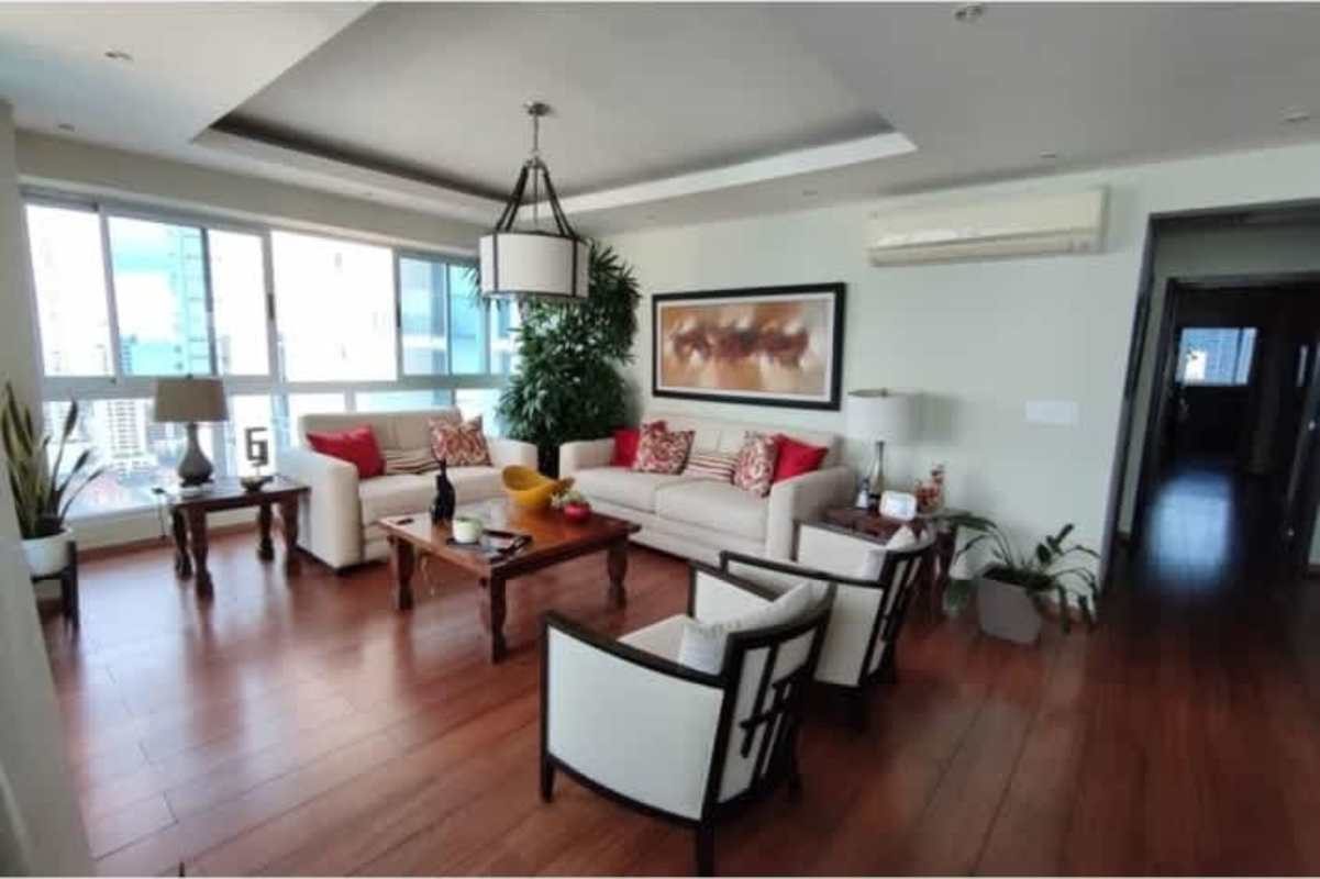Open plan living room with city views, modern decor, in PH Mirador del Mar Coco del Mar Panama