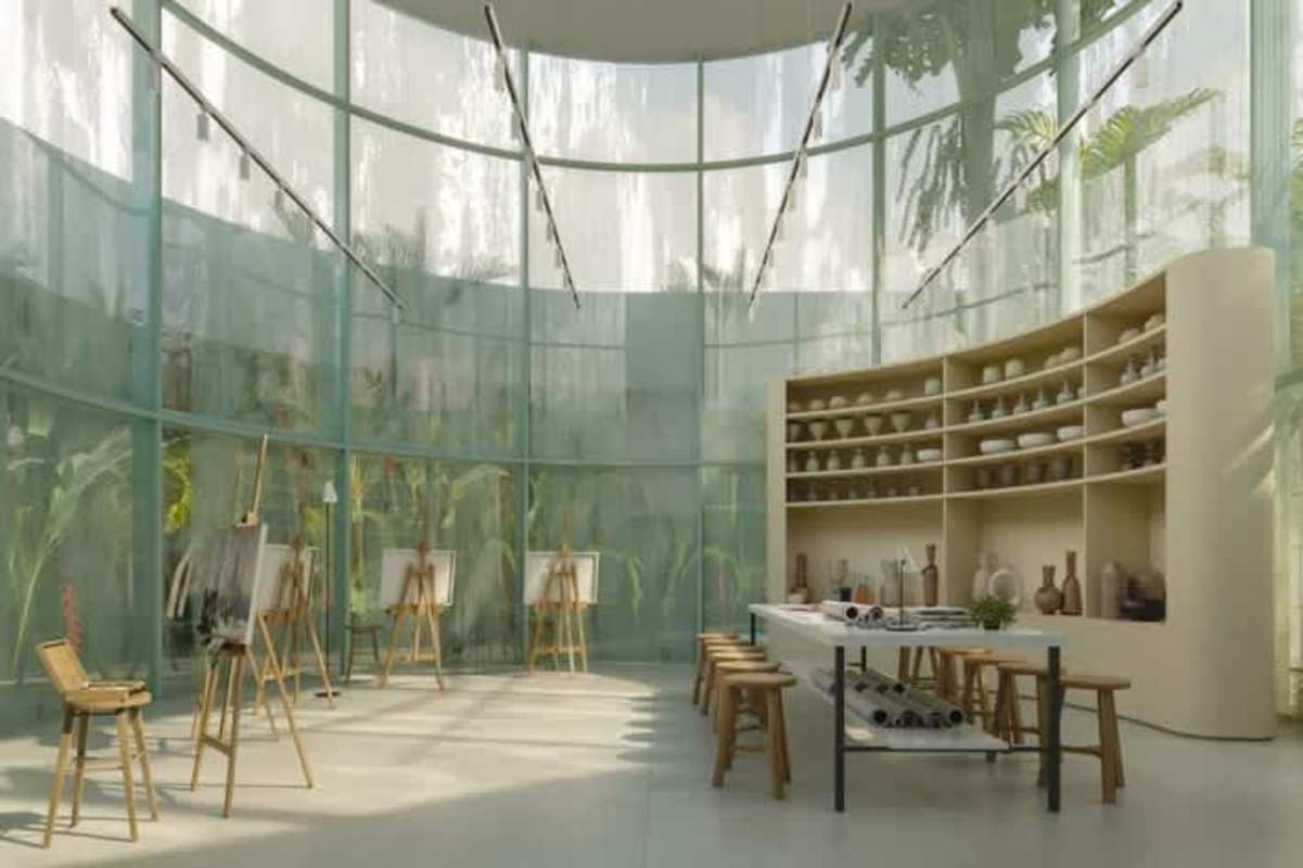 Bright art studio with floor-to-ceiling glass, easels, and natural light in new luxury condo Panama