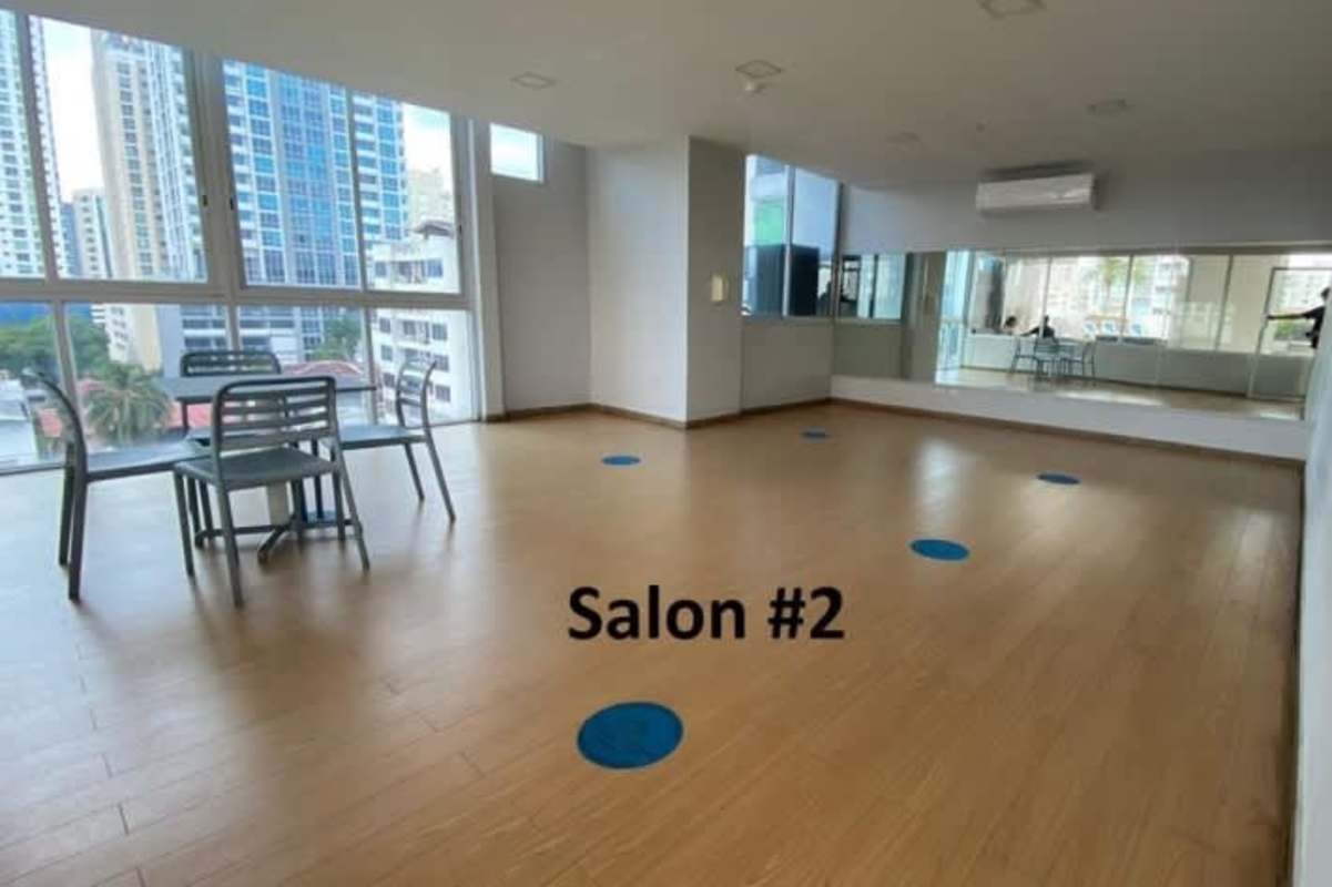 Bright open living dining area with modern lighting, large windows in PH Sky Blue Tower San Francisco