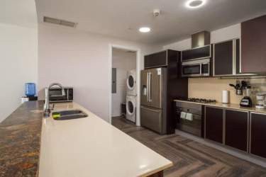 Bedroom with panoramic ocean views and balcony access in Punta Arena Buenaventura Panama