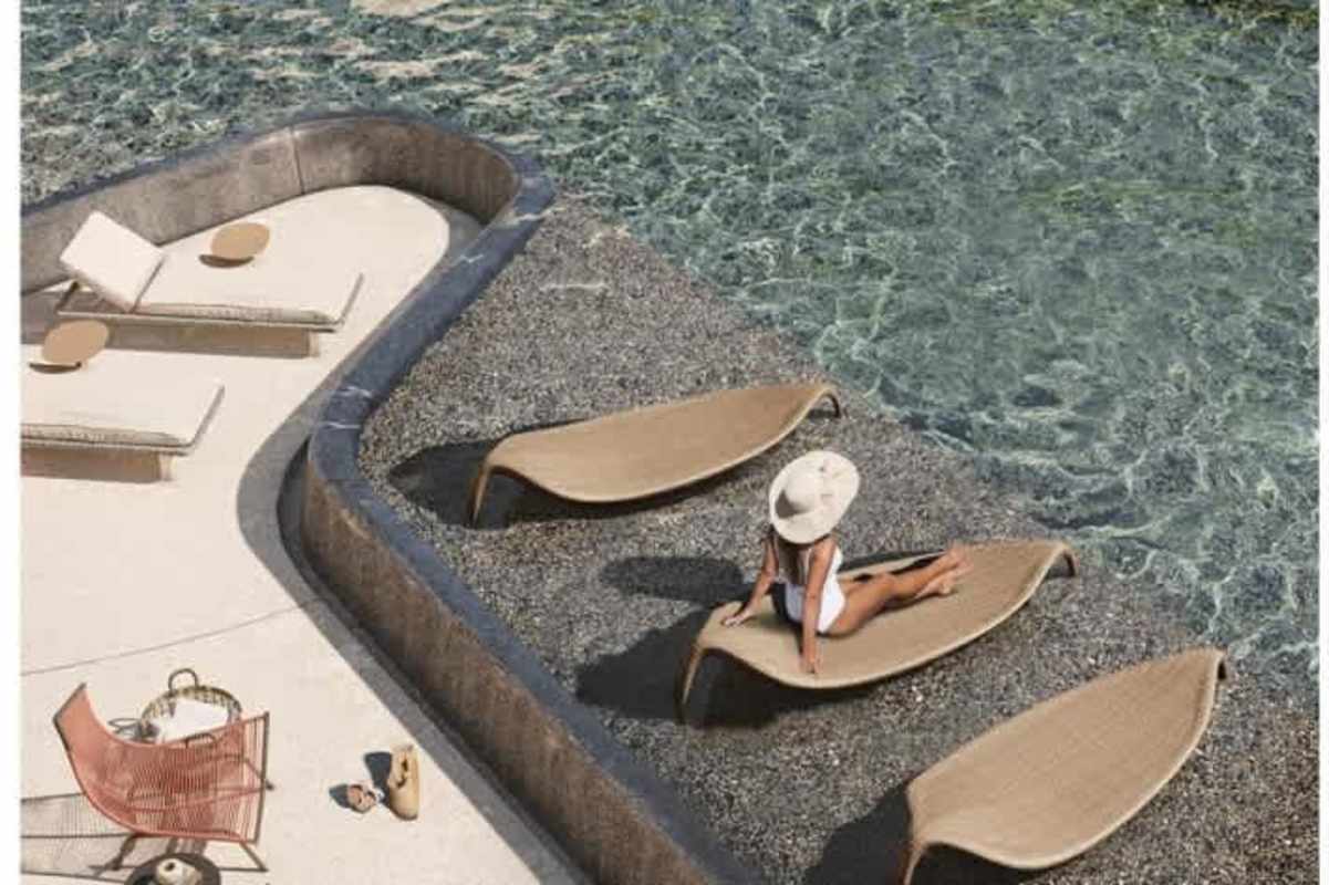 Resort-style infinity pool area with sun loungers PH Regalia Costa del Este Panama