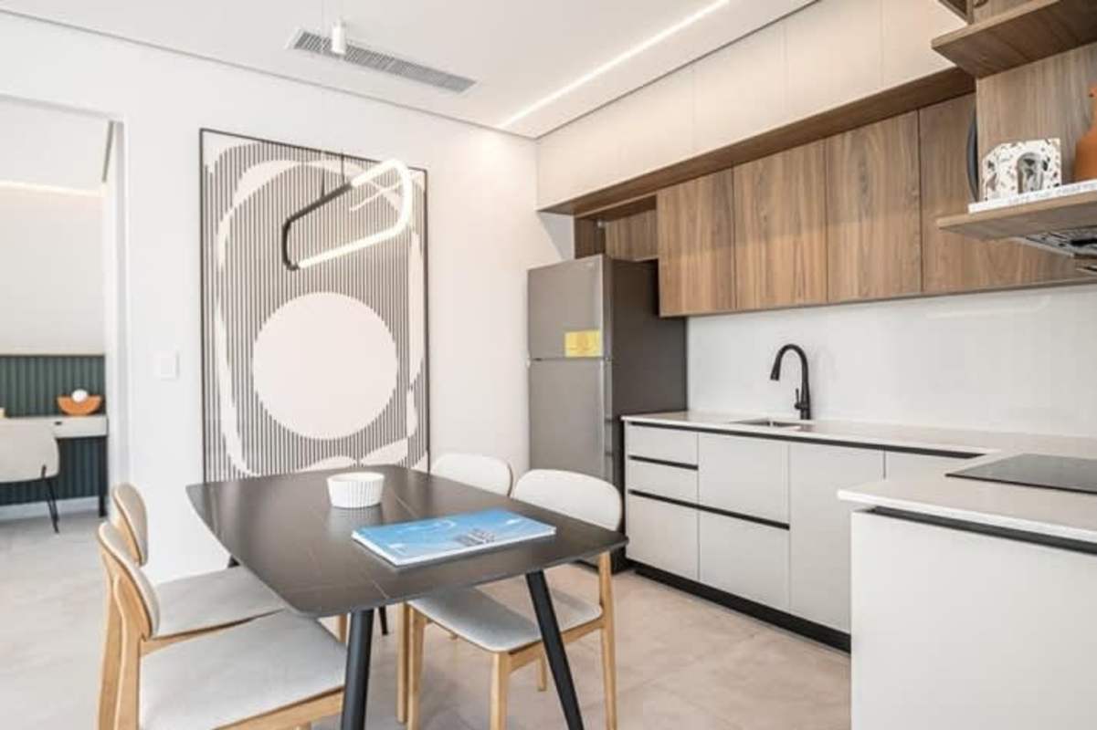 Stylish minimalist kitchen with quartz counters at PH Costa del Este condo Panama