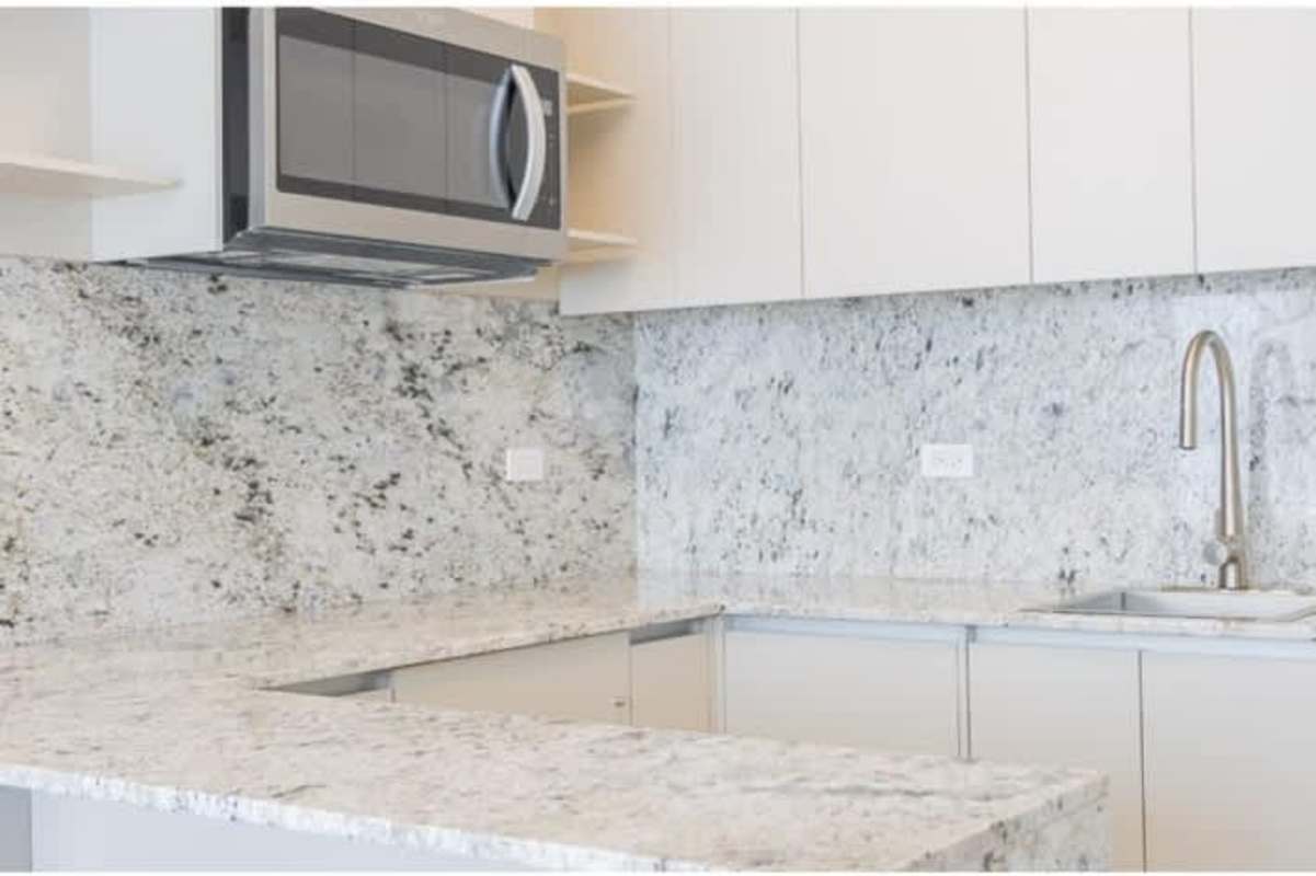 Granite kitchen with built-in stainless appliances PH Skypark Costa del Este Panama