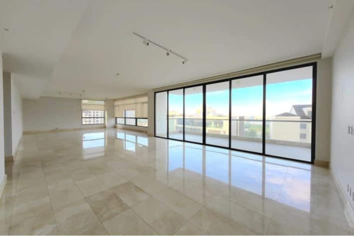 Bathroom with marble counters and glass enclosed shower PH Albatross Santa María