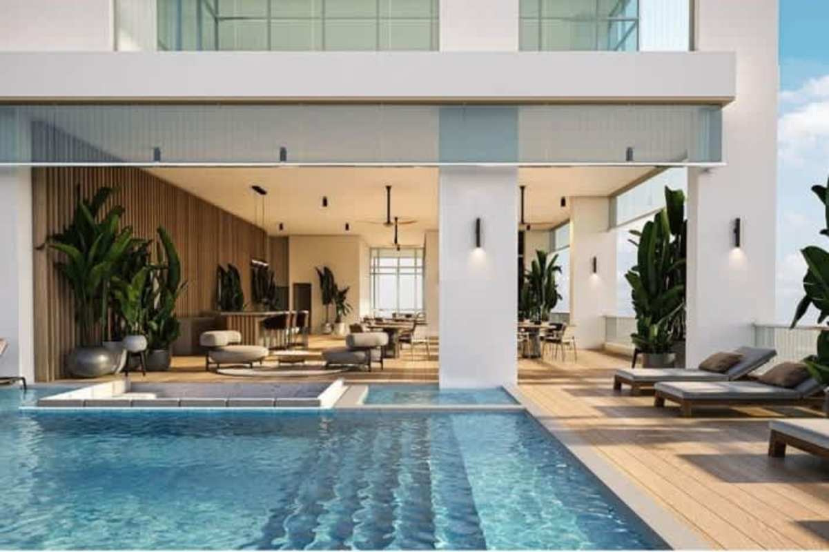 Rooftop infinity pool and open-air lounge with skyline views on PH Sky Balboa Tower Panama City