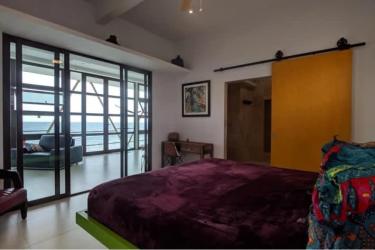 Modern living room with ocean view sliding doors in Royal Palm Playa Gorgona Panama