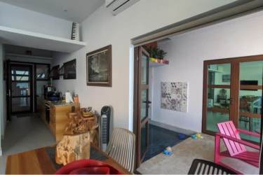 Dining space with floor-to-ceiling ocean view windows Royal Palm Gorgona Panama