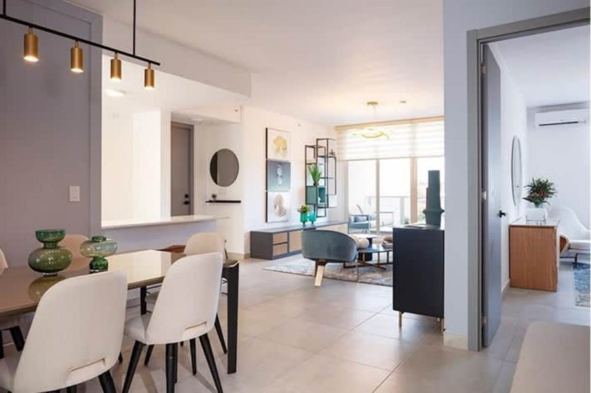 Open plan modern living and dining room with natural light in PH El Cangrejo 1052 Panama