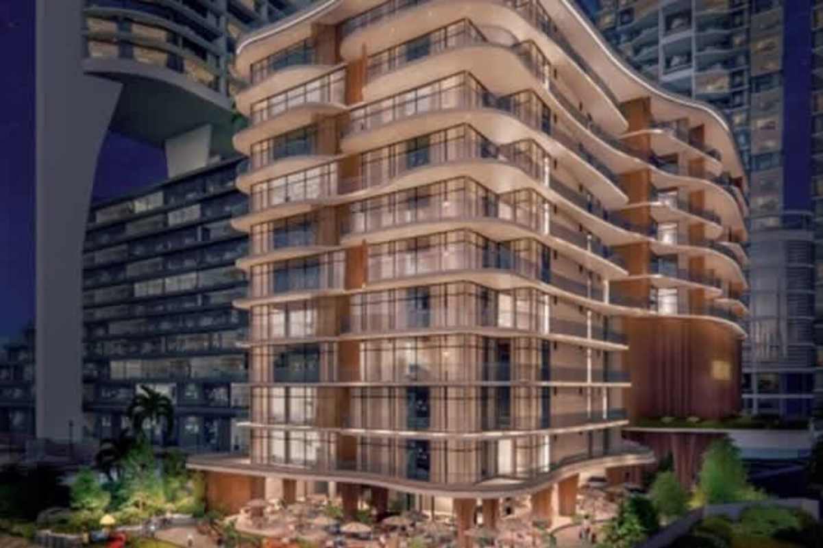 Open living dining room with natural light ocean view balcony in new Punta Pacífica luxury condo