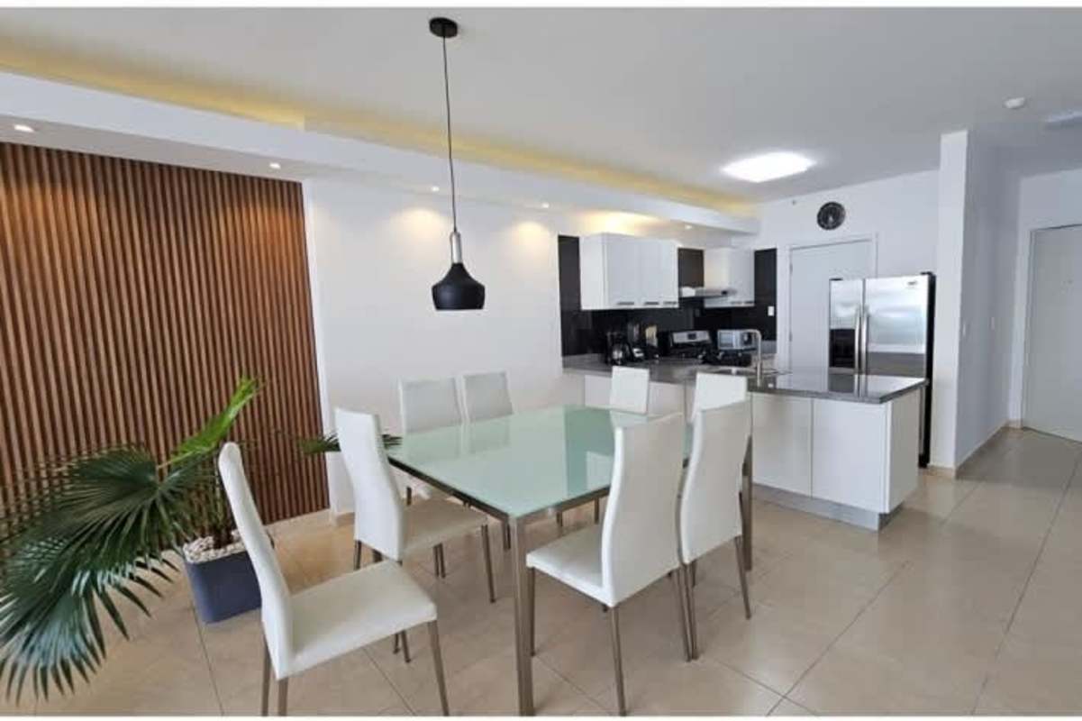 Open concept dining area and kitchen with ocean views at PH Waters on the Bay Panama City