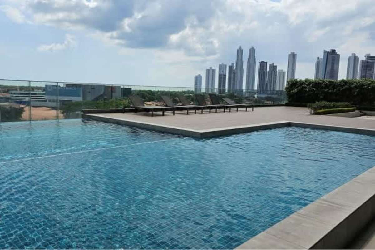 Rooftop infinity swimming pool with city skyline view luxury condo Santa María Panama