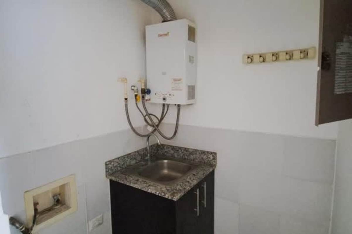 Bedroom with large window and mountain view PH Altamira Gardens Ancon Panama