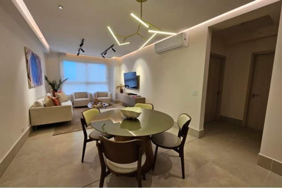 Luxury bedroom featuring large windows with view of golf course Santa Maria Panama