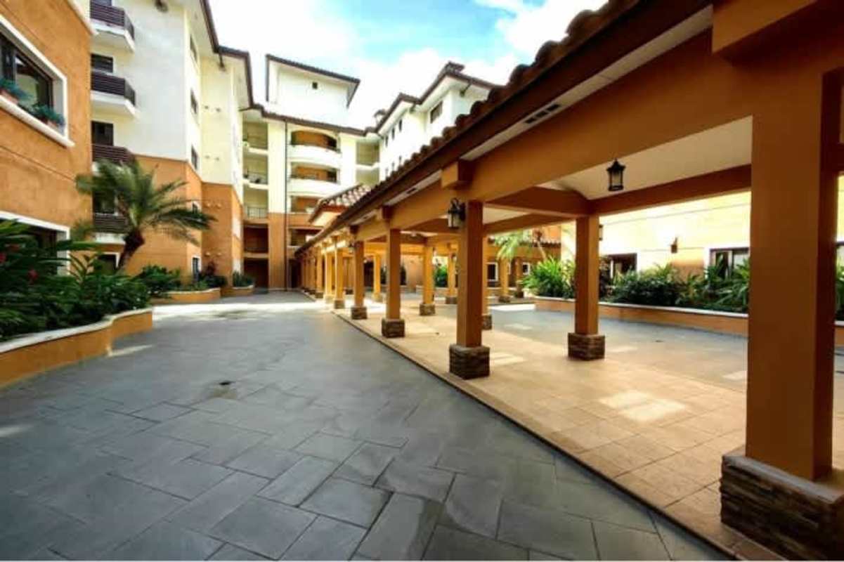 Mediterranean-style apartment with balconies and arches at Embassy Club Clayton Panama