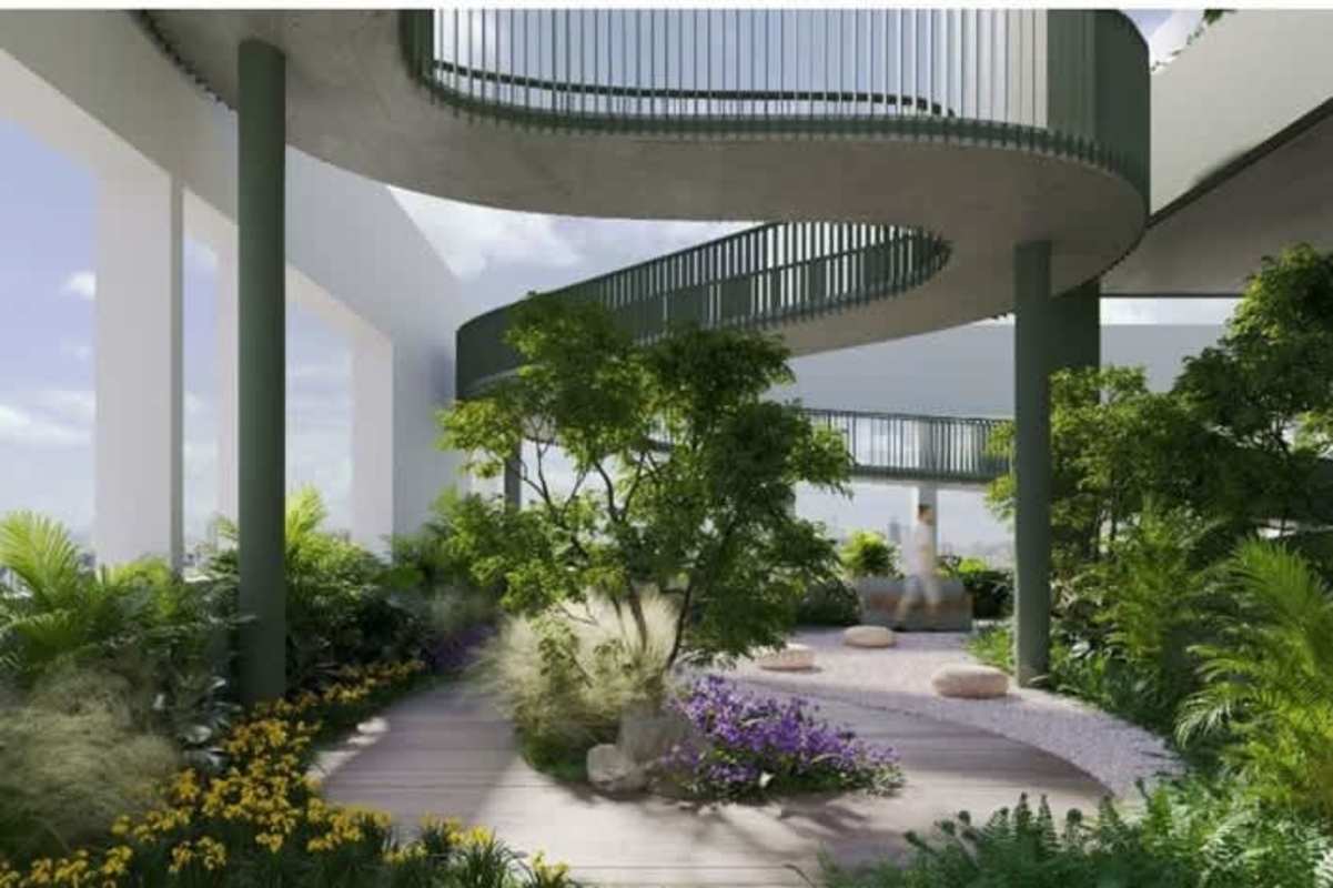 Private balcony with potted plants overlooking city skyline and Pacific Ocean