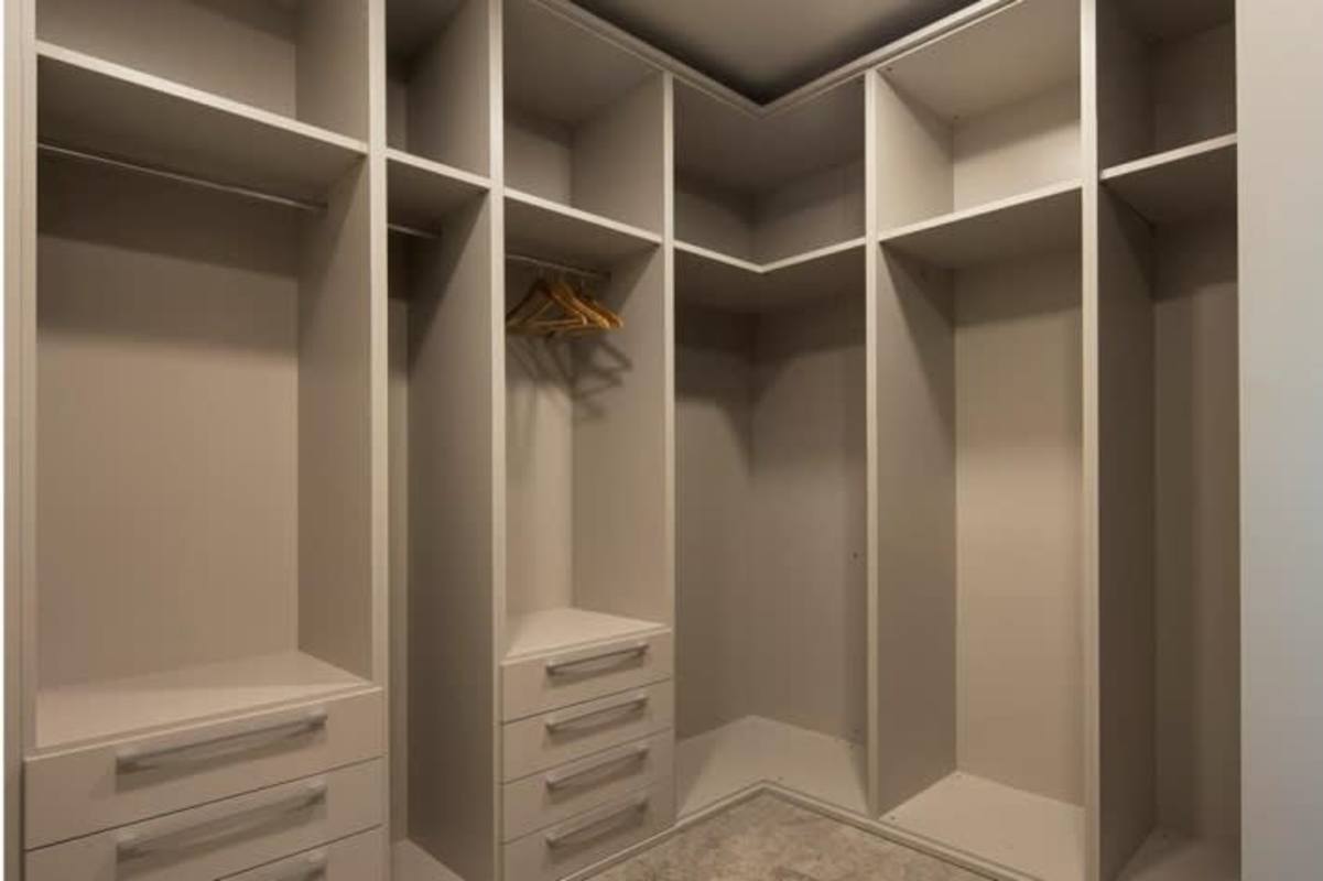 Custom luxury walk-in closet modern finishes PH Pacific Point Panama