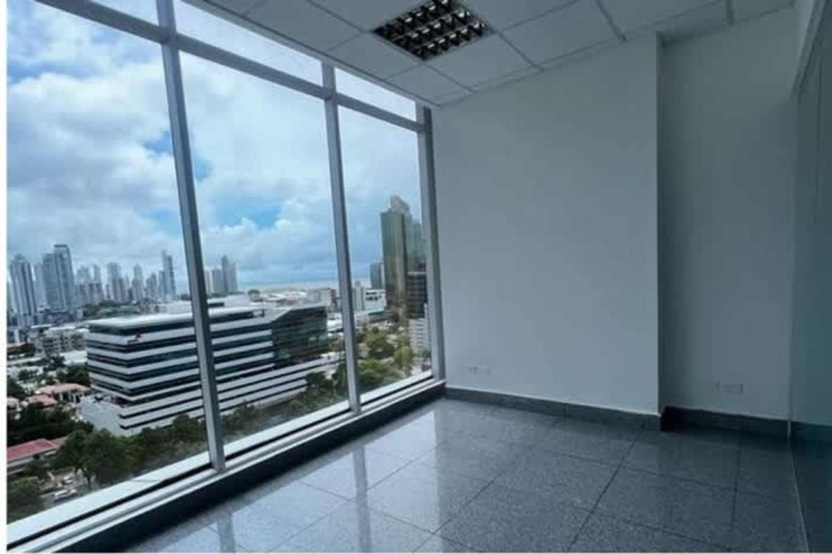 Empty modern office floor with glass and skyline city views in Banking District Panama