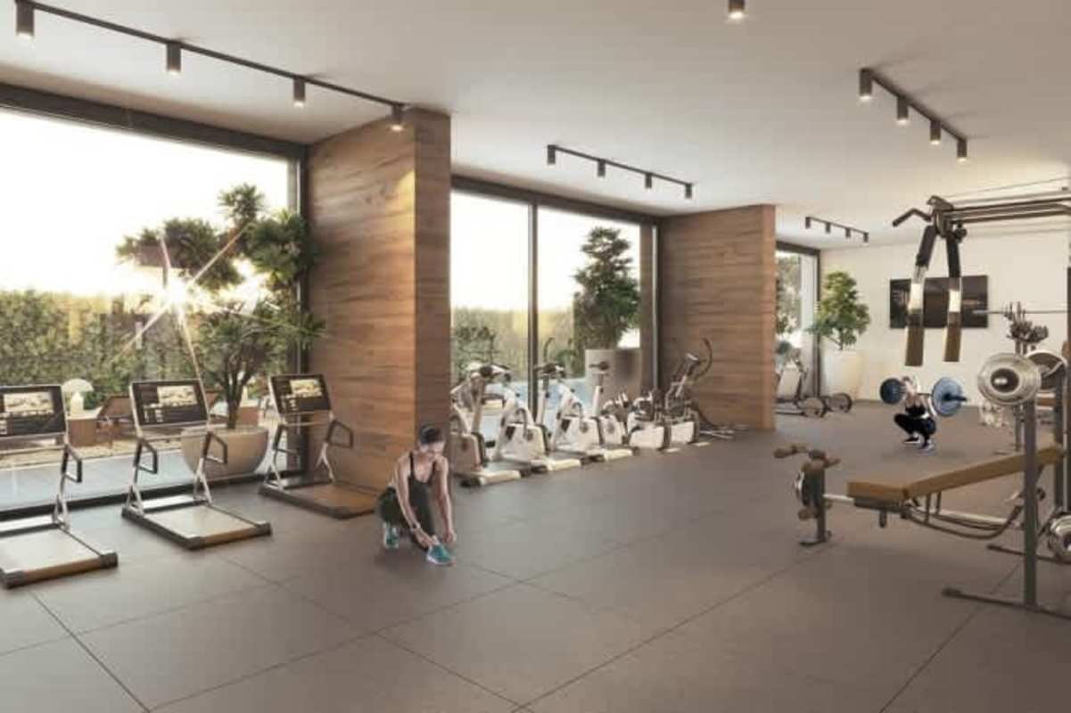 Rooftop infinity pool with lounge areas and sunset views in PH Smart Suites San Francisco Panama City